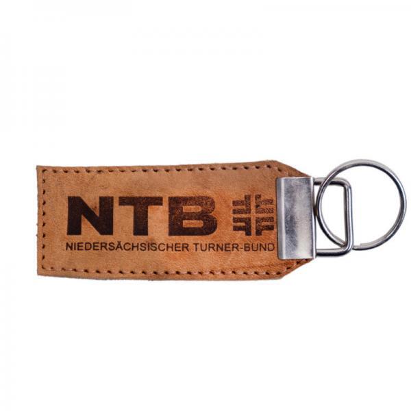 Ein Schlüsselanhänger aus Leder mit Branding NTB